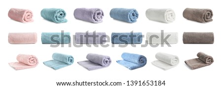 Set of different clean terry towels on white background Royalty-Free Stock Photo #1391653184