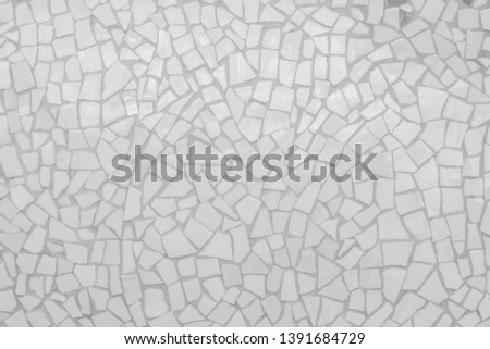 Broken tiles mosaic seamless pattern. White and Gray tile real wall high resolution real photo or brick seamless with texture interior background. Abstract wallpaper irregular in bathroom.