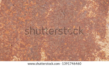 Rusty metal texture background with cracked white paint, old iron plate texture, brown steel wall