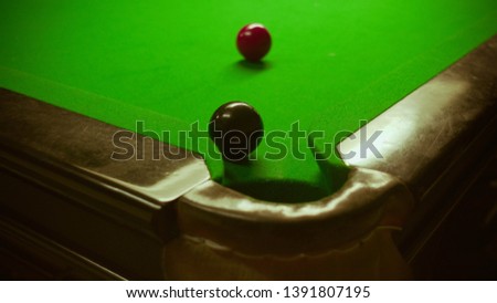 close up corner snooker table with snooker balls on green