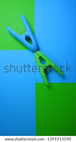 Clothespin in green and blue background