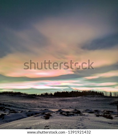 Nacreous clouds over eastern Iceland Royalty-Free Stock Photo #1391921432