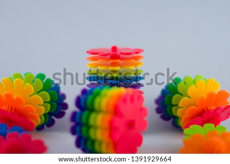 Shapes or Designs created with Multicolored Flower Shaped Blocks