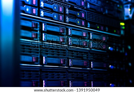 Close up server rack cluster in a data center selected focus, narrow depth field Royalty-Free Stock Photo #1391950049