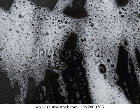 Soap foam Shaving cream bubble isolated on black background top view object health concept - Image 