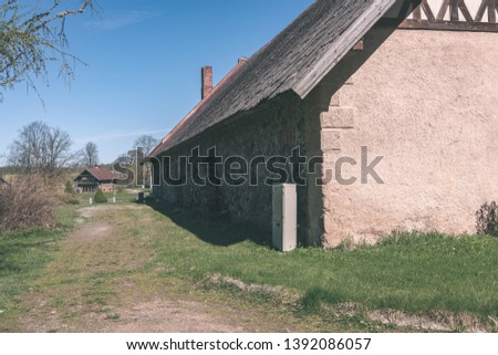 old wooden countryside house architecture details and elements of construction - vintage retro film look