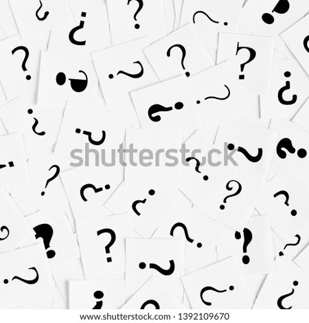 Pile of question mark signs scattered around as a square background. Decision, enquiry or faq concept.