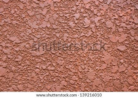 Surface of the cement wall.