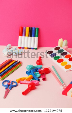 School supplies on ink vivid bright table, back to school concept, modern 3d background