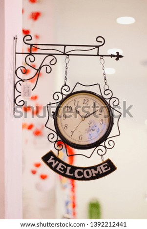 Welcome sign and Clock in the gift shop