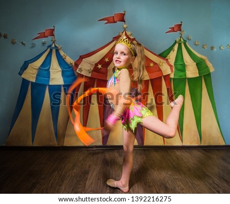 beautiful girl gymnast in the circus