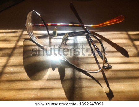 A nice shot of some morning sunshine bouncing off a pair of reading glasses. 