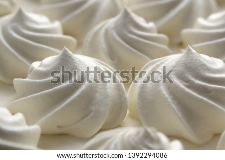 festive curls for white meringue cream cake