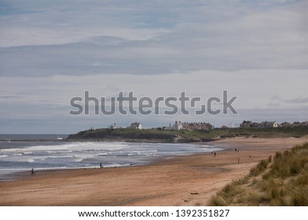 The village of Seaton Sluice in Northumberland on the North East coast of England, pictured looking south from the sand dunes