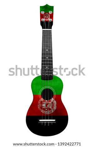 Hawaiian national guitar, ukulele, with a painted Afghanistan flag, on a white isolated background, as a symbol of folk art or a national song. Vertical frame