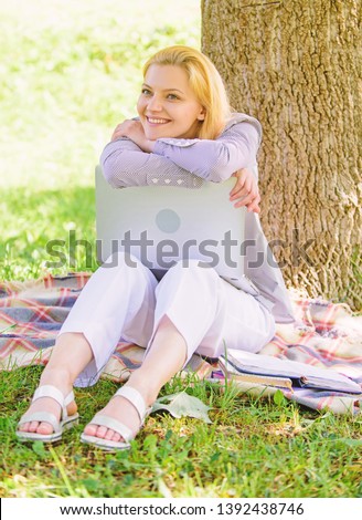 Woman with laptop work outdoors lean tree. Minute for relax. Education technology and internet concept. Work outdoors benefits. Girl work with laptop in park sit on grass. Natural environment office.
