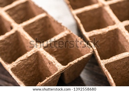 Seed starter pots made out of peat moss. Royalty-Free Stock Photo #1392558680