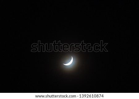 waxing crescent moon on clear night