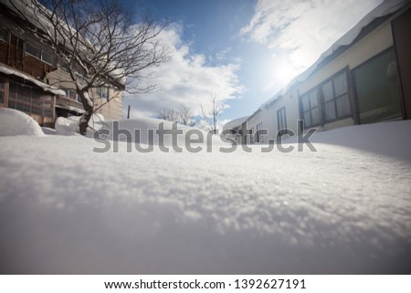 House covered with snow in winter