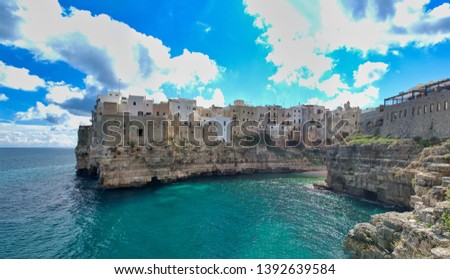 Polignano a Mare - Apulia, Italy. Beautiful aerial view of cityscape and coastline on a beautiful summer day.