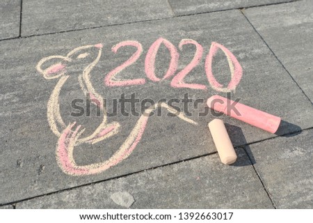 2020 new year of the rat. Top view on text and picture, 2020 and pretty mouse