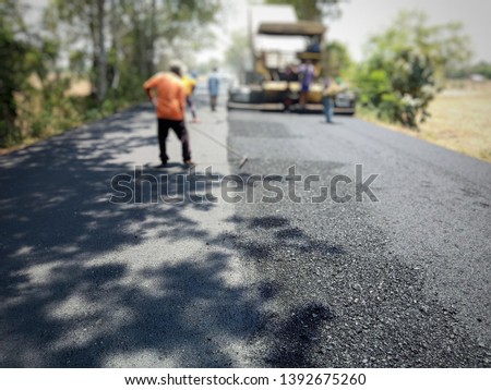 Asphalt road construction in Thailand, blurred images