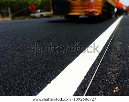Road traffic paint on the asphalt surface And to ensure safety