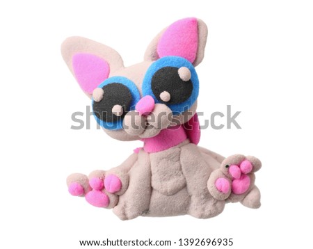 plasticine cat isolated on white background. modelling clay