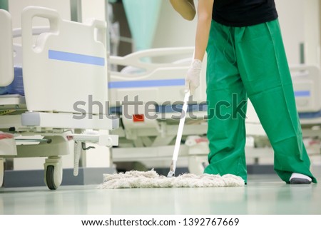 Professional office cleaner is holding Mop
Hospital cleaning staff, hospital beds,Cleaning the hospital floor,Cleaner Royalty-Free Stock Photo #1392767669