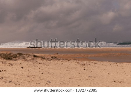 Splashing waves on the beach of Tarifa