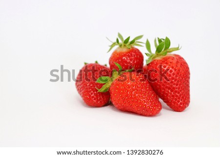 Beautiful red strawberries on a white background