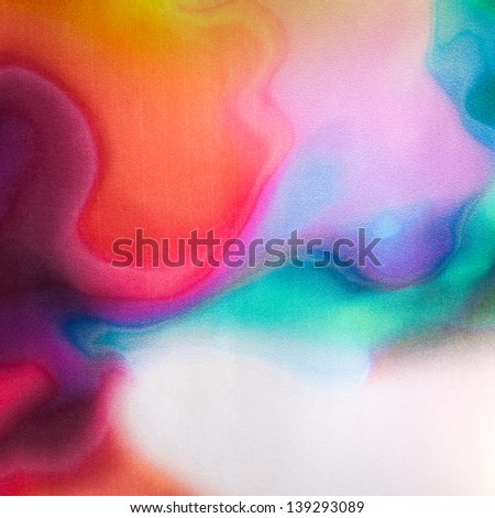 abstract watercolor background made from colored fabric