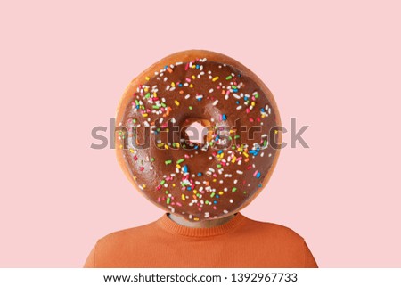 A man with a donut instead of head. Minimal summer concept.
