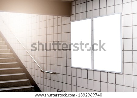blank advertising light box with copy space for your text message or media and content in subway station with stair, marketing and advertising concept 