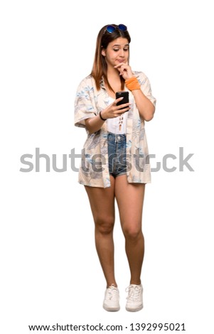 Full-length shot of Young woman in bikini in summer holidays thinking and sending a message over isolated white background