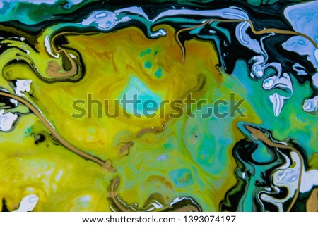 an abstract photograph using milk and acrylic paint 