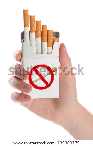 Woman hand with box of cigarettes, isolated on white