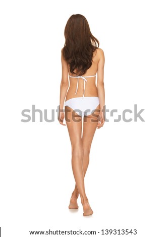 picture of model posing in white bikini.