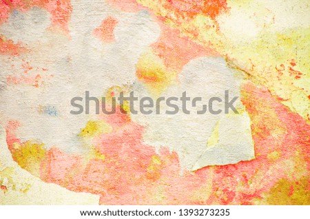 Light spots on the color wall. Close up image of the wall of a building with large white spots. Old plaster, cracks on the wall. Cracked vintage finish. Colored background, copy space.