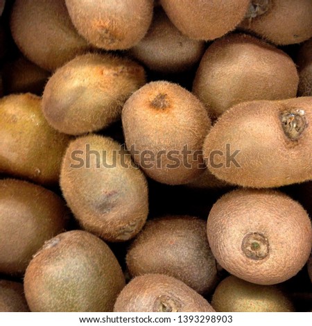 Macro photo food tropical fruit kiwi. Stock photo Texture hairy fruit kiwi.