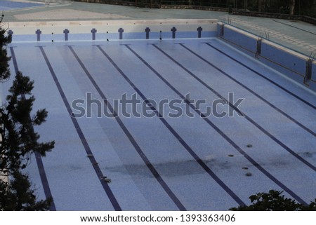 Empty swimming pool under maintenance