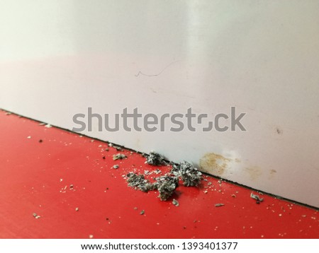 Ashes of burned ciggaret on the table