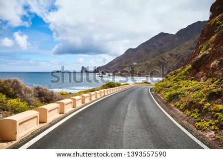 Scenic road at the Macizo de Anaga mountain range, Atlantic Ocean coast of Tenerife, Spain. Royalty-Free Stock Photo #1393557590