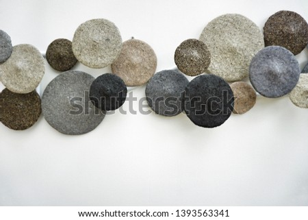 Wall decoration makes from a mixture of sawdust, sand and cement. Sawdust can be recycled as a resource material to produce  suitable light weight products.