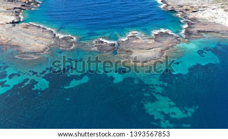 Aerial drone photo of tropical volcanic white rock deep turquoise paradise bay with beautiful colours