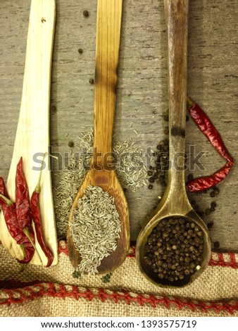 Herbs and spices on a wooden table