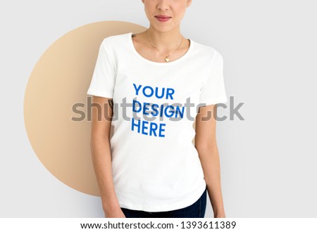 Woman wearing a white tee mockup Royalty-Free Stock Photo #1393611389