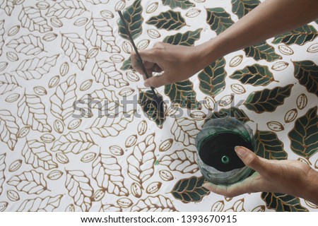 batik jember indonesia, a traditional making batik clothes from East Java Indonesia - image Royalty-Free Stock Photo #1393670915
