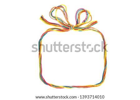 Colorful rectangular  frame with bow as gift box made of thread isolated on white background. Empty frame of cotton thread.
