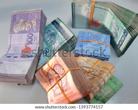 Bundle of money. Malaysia Ringgit (MYR) Bank Note RM100, RM50, RM20, RM10, RM5, RM1. - Business concept image.
